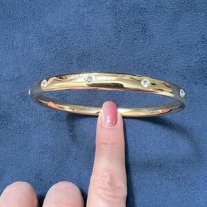 Gold bangle with crystals